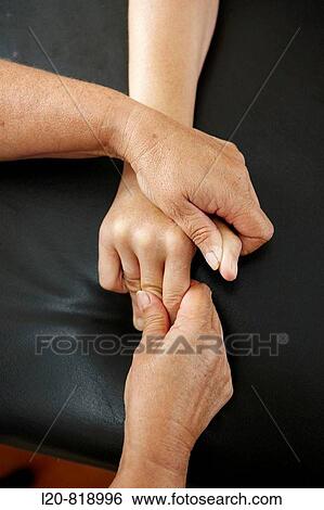 Occupational therapy, physiotherapy, hands: relaxing exercise, hemiplegia, stroke. Hospital Universitario de Gran Canaria Doctor Negrin, Las Palmas de Gran Canaria. Canary Islands, Spain View Large Photo Image Stock Photograph - Occupational therapy, physiotherapy, hands: relaxing exercise, hemiplegia, stroke. Hospital Universitario de Gran Canaria Doctor Negrin, Las Palmas de Gran Canaria. Canary Islands, Spain. Fotosearch