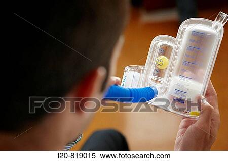 Stock Photography - Occupational therapy, Spiro-Ball Volumetric Incentive Spirometer, respiratory therapy, interstitial pneumopathy. Hospital Universitario de Gran Canaria Doctor Negrin, Las Palmas de Gran Canaria. Canary Islands, Spain. Fotosearch