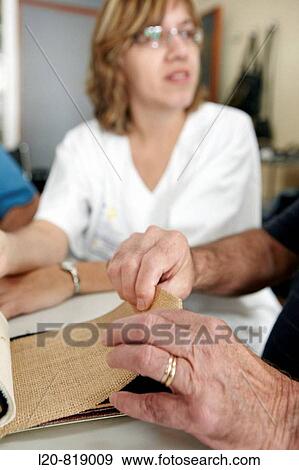 Stock Photo - Occupational therapy, textures: shape and texture recognition exercise, exteroception. Hospital Universitario de Gran Canaria Doctor Negrin, Las Palmas de Gran Canaria. Canary Islands, Spain. Fotosearch