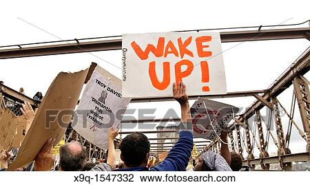 October 01, 2011, Manhattan, Occupy Wall Street protestors stopped traffic on the Brooklyn Bridge, Occupy Wall Street is an ongoing series of demonstrations in New York City, protesting against social and economic inequality View Large Photo Image Stock Image - October 01, 2011, Manhattan, Occupy Wall Street protestors stopped traffic on the Brooklyn Bridge, Occupy Wall Street is an ongoing series of demonstrations in New York City, protesting against social and economic inequality. Fotosearch