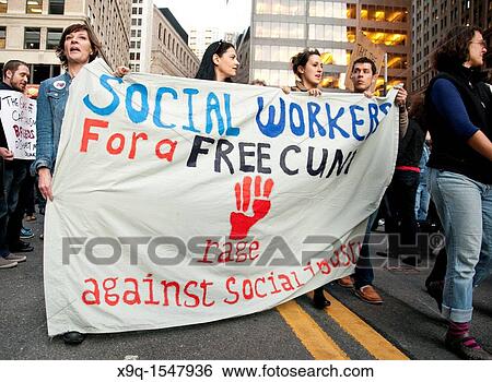 October 05, 2011, Downtown Manhattan, Wall Street financial area vicinity, Occupy Wall Street is an ongoing series of demonstrations in New York City, protesting against social and economic inequality View Large Photo Image Stock Photograph - October 05, 2011, Downtown Manhattan, Wall Street financial area vicinity, Occupy Wall Street is an ongoing series of demonstrations in New York City, protesting against social and economic inequality. Fotosearch
