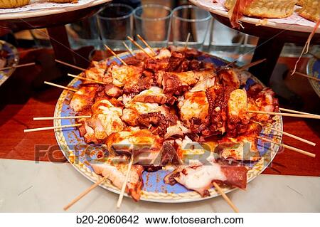 Octopus skewer,? pintxos? at Bar Txondorra in ol town, Donostia (San Sebastian), Gipuzkoa, Basque Country, Spain View Large Photo Image Stock Image - Octopus skewer,? pintxos? at Bar Txondorra in ol town, Donostia (San Sebastian), Gipuzkoa, Basque Country, Spain. Fotosearch