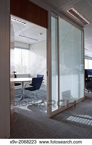 Office interior view through door. View Large Photo Image Stock Image - Office interior view through door.. Fotosearch