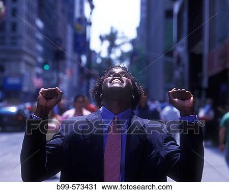 Stock Image - Office worker, Fifth Avenue, Midtown, Manhattan, New York, USA. Fotosearch