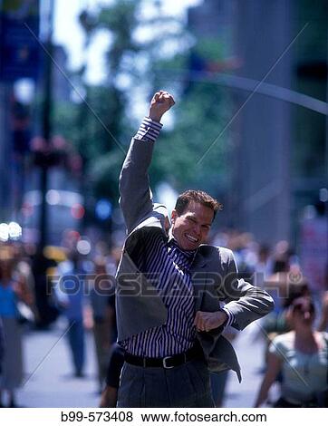 Office worker jumps on fifth Avenue, Midtown, Manhattan, New York, USA View Large Photo Image Stock Photo - Office worker jumps on fifth Avenue, Midtown, Manhattan, New York, USA. Fotosearch