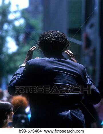 Picture - Office worker on fifth Avenue, Midtown, Manhattan, New York, USA. Fotosearch