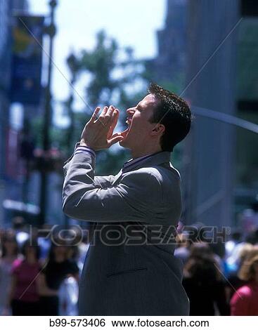 Stock Photograph - Office worker on fifth Avenue, Midtown, Manhattan, New York, USA. Fotosearch