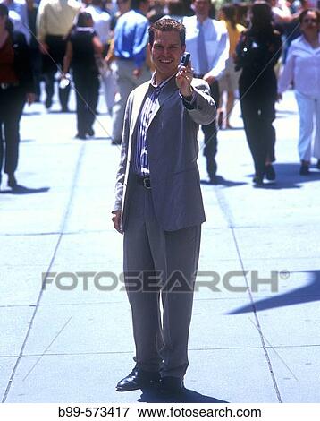 Office worker with cell phone, Fifth Avenue, Midtown, Manhattan, New York, USA View Large Photo Image Stock Photo - Office worker with cell phone, Fifth Avenue, Midtown, Manhattan, New York, USA. Fotosearch