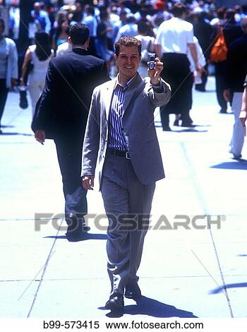 Office worker with cell phone, Fifth Avenue, Midtown, Manhattan, New York, USA View Large Photo Image Stock Photography - Office worker with cell phone, Fifth Avenue, Midtown, Manhattan, New York, USA. Fotosearch