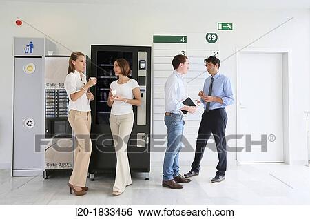 Stock Photograph - Office workers taking a break. Fotosearch