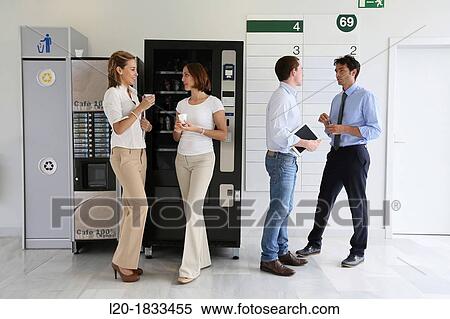 Office workers taking a break View Large Photo Image Stock Photography - Office workers taking a break. Fotosearch