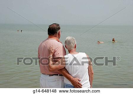 Stock Photo - Ohio, Toledo, Oregon, Maumee Bay State Park, Lake Erie, couple, man, woman, swimmers,. Fotosearch