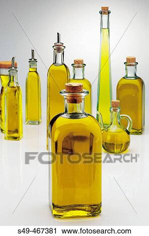 Oil bottles. View Large Photo Image Stock Image - Oil bottles.. Fotosearch