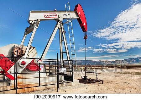 Oil well with pump at Kern Co. California. View Large Photo Image Stock Photo - Oil well with pump at Kern Co. California.. Fotosearch