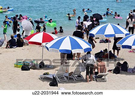 Okinawa, Japan, people bathing at Chura Sun Beach View Large Photo Image Picture - Okinawa, Japan, people bathing at Chura Sun Beach. Fotosearch