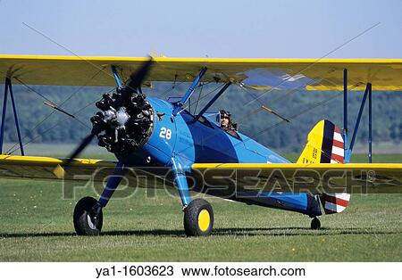 Stock Image - Old american trainer biplane Boeing PT-17 Kaydet / Stearman model 75, France. Fotosearch
