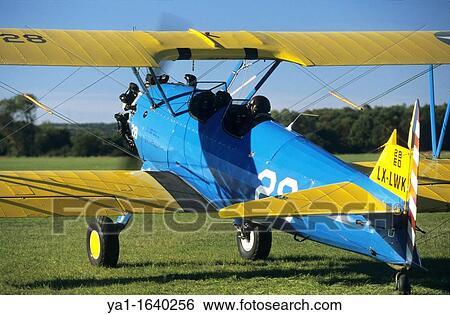 Old american trainer biplane Boeing PT-17 Kaydet / Stearman model 75 ready to departure View Large Photo Image Stock Photograph - Old american trainer biplane Boeing PT-17 Kaydet / Stearman model 75 ready to departure. Fotosearch