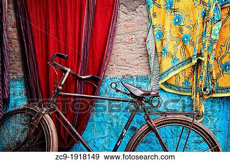 Old bicycle parked against a wall Puri, Orissa, India View Large Photo Image Stock Photo - Old bicycle parked against a wall Puri, Orissa, India. Fotosearch