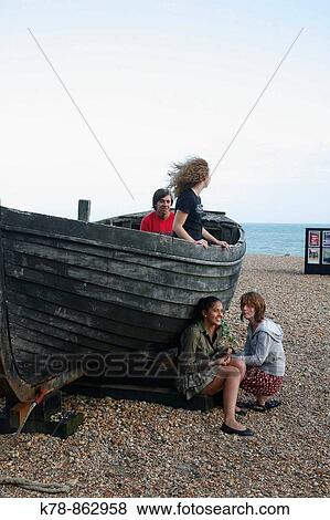Stock Photo - Old boat at Brighton beach, Brighton, England, UK. Fotosearch