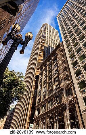Old building cramped between modern skyscrapers on Kearny Street, San Francisco, California, USA. View Large Photo Image Stock Photo - Old building cramped between modern skyscrapers on Kearny Street, San Francisco, California, USA.. Fotosearch