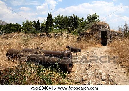 old cannons abandoned in the Castle of Parga, Greece View Large Photo Image Stock Photography - old cannons abandoned in the Castle of Parga, Greece. Fotosearch