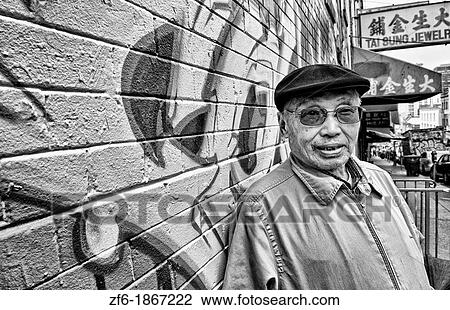 Old Chinese man with wall mural in Chinatown San Francisco California View Large Photo Image Stock Image - Old Chinese man with wall mural in Chinatown San Francisco California. Fotosearch