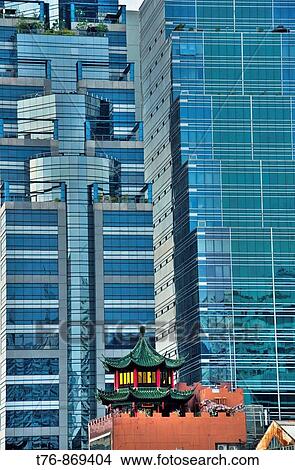 old Chinese temple dwarfed by modern highrise in Bangkok Thailand View Large Photo Image Picture - old Chinese temple dwarfed by modern highrise in Bangkok Thailand. Fotosearch