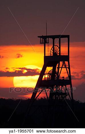 Old coal mine pit on Sunset, Puit Simon 2 HBL, Forbach, Moselle, Lorraine, France View Large Photo Image Stock Image - Old coal mine pit on Sunset, Puit Simon 2 HBL, Forbach, Moselle, Lorraine, France. Fotosearch