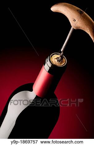 Old Corkscrew Opening a Bottle of Wine View Large Photo Image Stock Photo - Old Corkscrew Opening a Bottle of Wine. Fotosearch