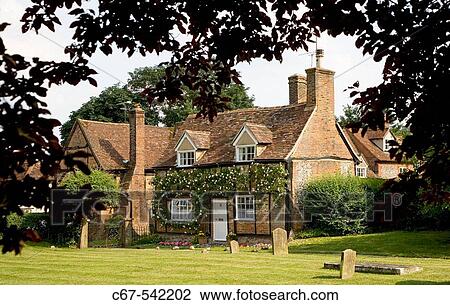 Stock Image - Old cottage & Garden Turville Buckinghamshire UK Late June. Fotosearch