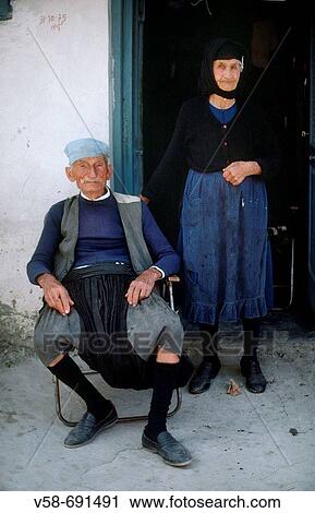 Old couple wearing the traditional dress, Kakopetria. Troodos mountains, Cyprus View Large Photo Image Stock Image - Old couple wearing the traditional dress, Kakopetria. Troodos mountains, Cyprus. Fotosearch