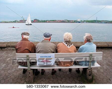 Old couples at free harbour watching sailing boat, Kiel, Germany View Large Photo Image Stock Photo - Old couples at free harbour watching sailing boat, Kiel, Germany. Fotosearch