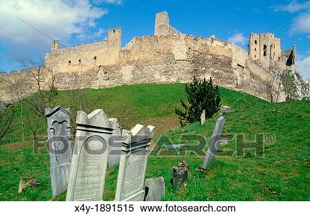 Stock Photography - Old derelict jewish gravestones near the ruins of castle Beckov, Slovakia. Fotosearch