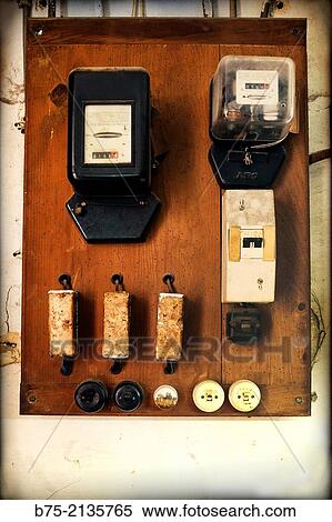 Stock Photography - Old distribution panel with different meters and fuses in Menorca, Balearics, Spain, Europe.. Fotosearch