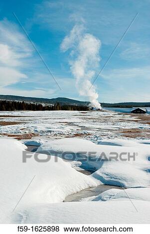 Stock Photo - Old Faithful Geyser, Yellowstone NP, WY. Fotosearch