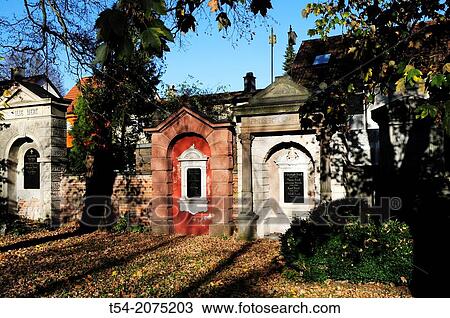Stock Image - Old family graves in a cemetery in Germany. Fotosearch