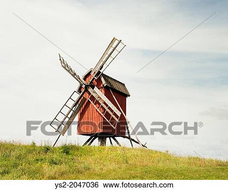 Old fashioned wooden windmill on a hill in Skanninge, Sweden. View Large Photo Image Stock Photograph - Old fashioned wooden windmill on a hill in Skanninge, Sweden.. Fotosearch