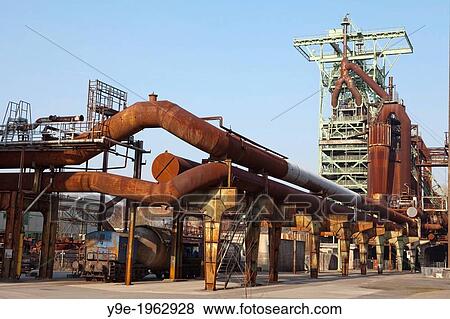 Stock Photo - Old industrial plants and a blast furnace, disused Henrichshuette steel works, now an industrial heritage museum, Hattingen, North Rhine-Westphalia, Germany, Europe.. Fotosearch