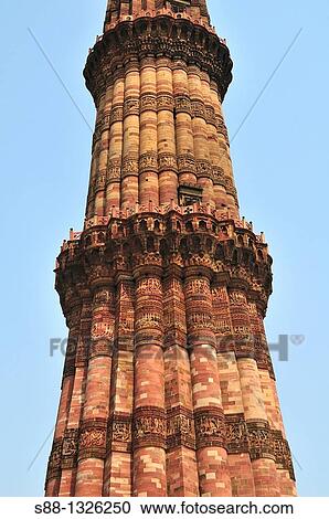 Stock Image - Old Islamic tower, Kutub Minar in Delhi, India. Fotosearch