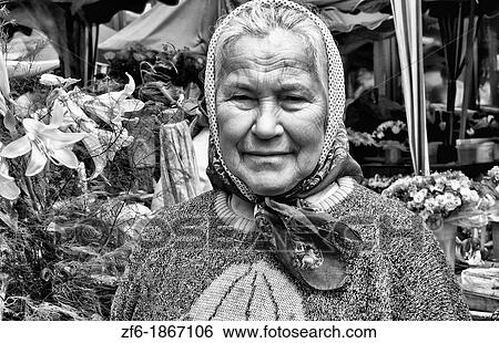 Old lady babushkas selling flowers at market in old town center city of Lviv Ukraine View Large Photo Image Stock Photograph - Old lady babushkas selling flowers at market in old town center city of Lviv Ukraine. Fotosearch
