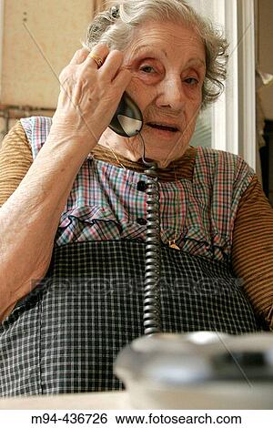 Old lady talking on the phone. View Large Photo Image Stock Photograph - Old lady talking on the phone.. Fotosearch