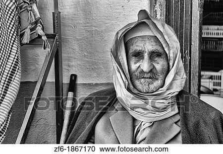 Old local colorful Arab portait of local man in Douz in Sahara Desert of Tunisia Africa View Large Photo Image Stock Image - Old local colorful Arab portait of local man in Douz in Sahara Desert of Tunisia Africa. Fotosearch