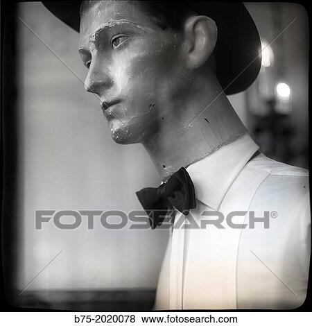 Stock Photo - old male mannequin in a shop window of Bates hat shop in Rue de Rivoli, Paris, France. Fotosearch