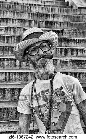 Old man dressed as character in glasses in Havana Cuba in the Caribbean View Large Photo Image Stock Image - Old man dressed as character in glasses in Havana Cuba in the Caribbean. Fotosearch