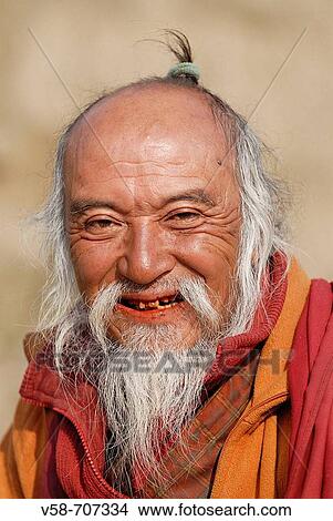 Old man in prayer, chimi lhakang temple, punakha region, Bhutan View Large Photo Image Picture - Old man in prayer, chimi lhakang temple, punakha region, Bhutan. Fotosearch