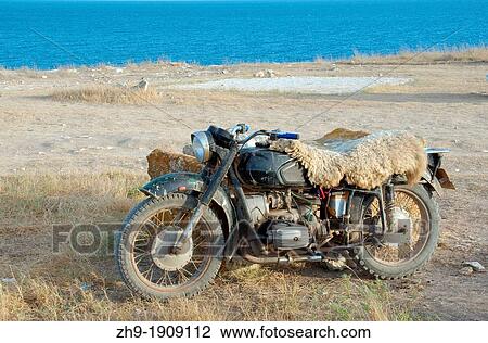 Old motorcycle, Cape Tarhankut, Tarhan Qut, Crimea, Ukraine, Eastern Europe View Large Photo Image Stock Image - Old motorcycle, Cape Tarhankut, Tarhan Qut, Crimea, Ukraine, Eastern Europe. Fotosearch
