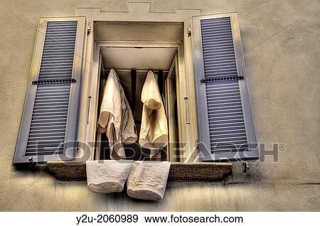 Old open window with shutter and clothes, Ascona, Switzerland. View Large Photo Image Stock Photo - Old open window with shutter and clothes, Ascona, Switzerland.. Fotosearch