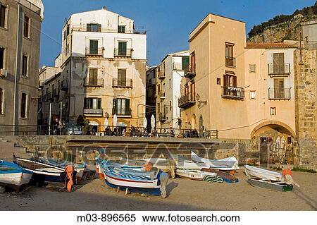 Old port Mt La Rocca fishing boats vessels beach Moorish architecture Town of Cefalu Palermo Province Sicily Italy View Large Photo Image Stock Photography - Old port Mt La Rocca fishing boats vessels beach Moorish architecture Town of Cefalu Palermo Province Sicily Italy. Fotosearch