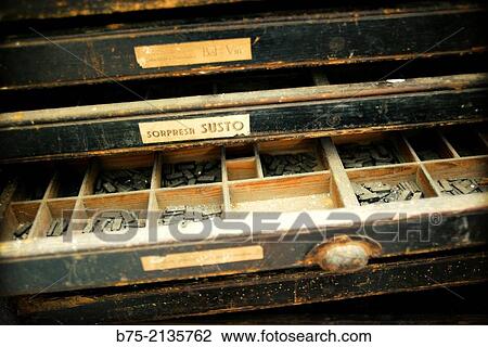 Old printer cabinet with an open drawer With the label of the typo-Surprise Susto, Surprise-Surprise. View Large Photo Image Stock Image - Old printer cabinet with an open drawer With the label of the typo-Surprise Susto, Surprise-Surprise.. Fotosearch