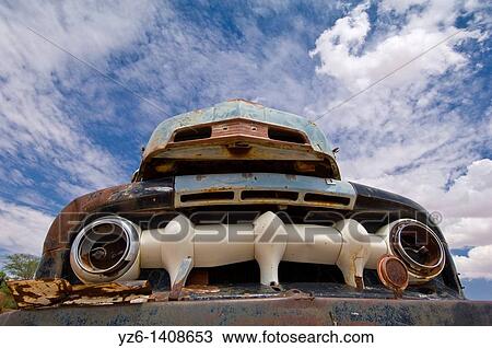 Stock Image - Old rusty car in Namib Desert Solitaire, Namibia. Fotosearch